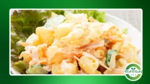 Salada morna de batatas com alho confitado e ervas frescas: alternativa refinada à maionese tradicional